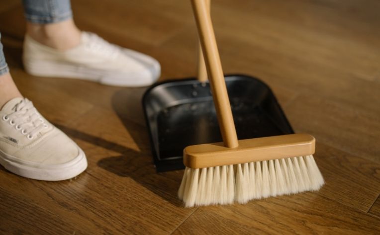 sweeping the floor
